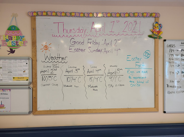 whiteboard with dates on it